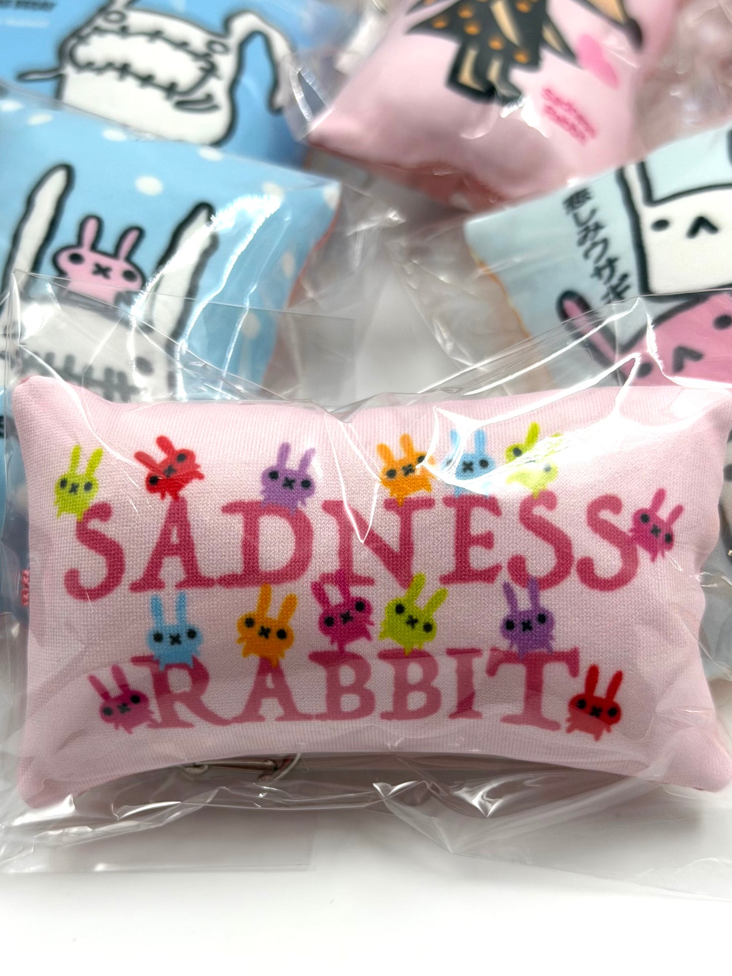 Sadness Rabbit: Pillow Keycharm